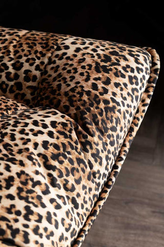 Close-up of the seat of the Leopard Print Velvet Swivel Chair.