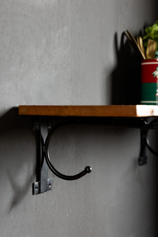 Image of the bracket for the Leopard Print Wooden Shelf With Bracket