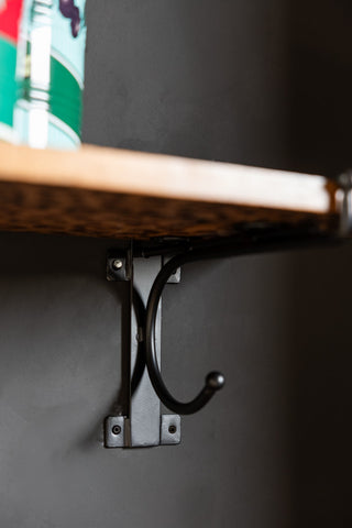 Close-up image of the Leopard Print Wooden Shelf With Bracket