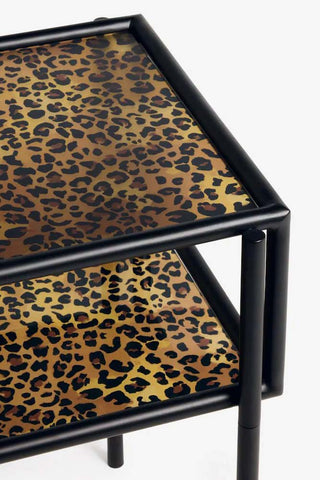 Close-up image of the Leopard Print & Glass Bedside Table