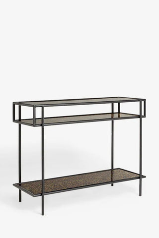 The Leopard Print & Glass Console Table seen from an angle, on a white background.