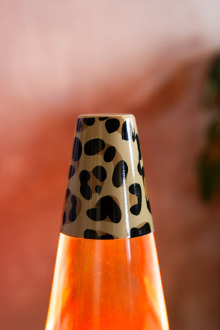 The leopard pattern on the top of the Leopard Print & Red Lava Lamp. 