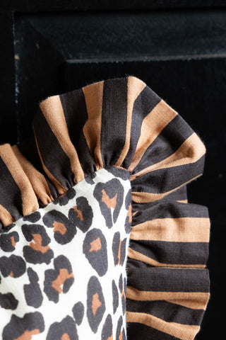 Image of the frill on the Leopard Print & Stripe Reversible Cushion
