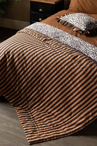 Detail image of the Leopard Print & Striped Reversible Quilt