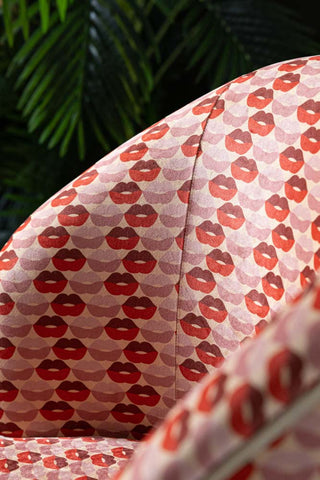 Close-up of the Lips Tassel Swivel Chair.
