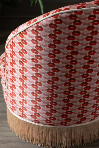 Close-up of the back of the Lips Tassel Swivel Chair.