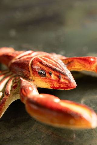 Close-up of the Lobster Cast Iron Boot Jack.