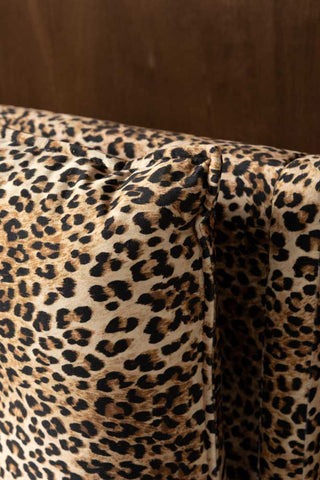 A close up shot of the cushion detailing on the Lounge Lover Bed in Leopard Print Velvet. 