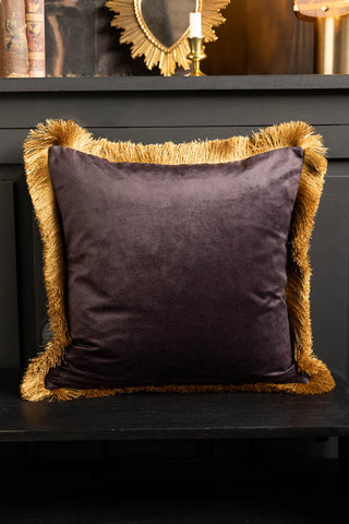 The reverse side of the Love Always Wins Fringed Velvet Cushion.