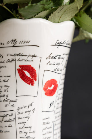Close up of the lips and love letter pattern on the Love Letters Flower Vase. 