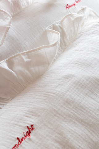Close-up image of the material for the Love Note White Ruffled Bedding Set - Available In 4 Sizes