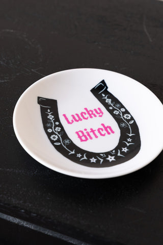 Close-up image of the Lucky Bitch Decorative Wall Plate
