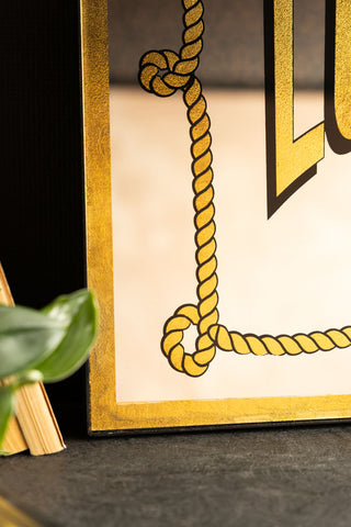 The corner of the Lucky You Mirror. 