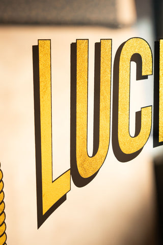 The typography on the Lucky You Mirror.. 