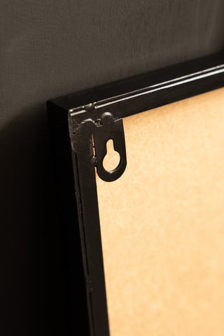 The fixing on the back of the Lucky You Mirror. 