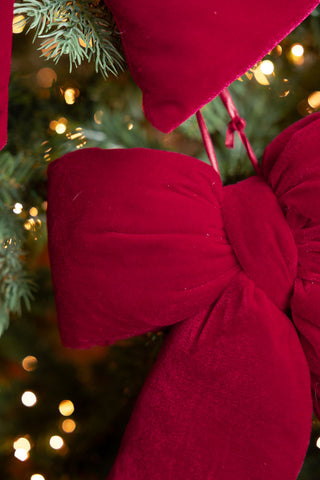 Image of the finish on the Luxurious Red Velvet Cushion Bow Christmas Decoration - Small