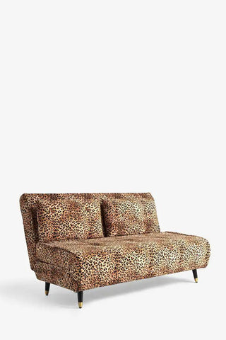 The Mabel Large 2 Seater Sofa Bed in Leopard Love Velvet seen from an angle, on a white background.