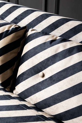 Close-up image of the Mabel Large 2 Seater Sofa Bed in Studio Stripe Velvet Sand & Black