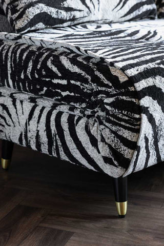 The detail on the folding corner of the Mabel Large 2 Seater Sofa Bed in Zebra Print Velvet. 
