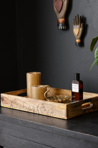 Lifestyle image of the Mango Wood Tray With Floral Engraving