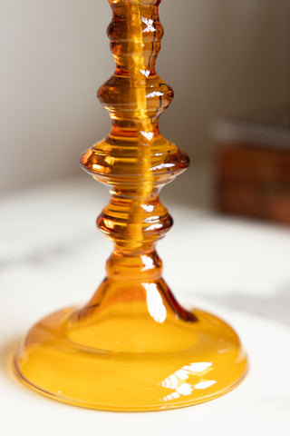 Image of the base of the Medium Amber Glass Refillable Candle Holder