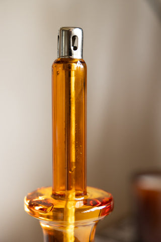 Detail image of the Medium Amber Glass Refillable Candle Holder