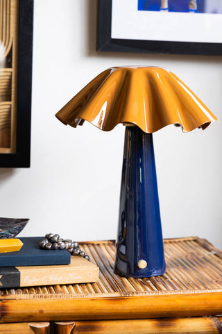 Lifestyle image of the Metal Fluted Tan & Navy Rechargeable Table Lamp