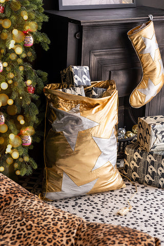 Lifestyle image of the Metallic Gold & Silver Star Christmas Sack