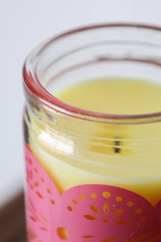 Detail image of the Mexican Folk Art Inspired Candle in Pink