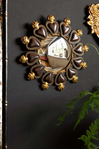 Lifestyle image of the Milagro Heart Round Convex Mirror