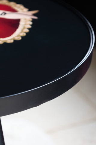 Close-up of the edge of the top of the Milagro Heart Round Side Table.