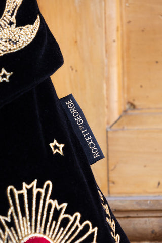 Image of the label on the Milagro Red & Gold Embroidered Christmas Stocking