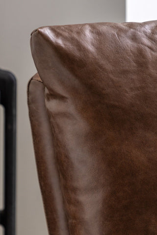 Close-up of the back of the Minimalist Brown Leather Lounge Chair.