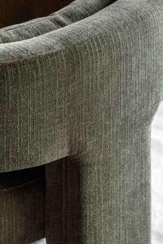 Close-up of the back of the Modern Green Accent Chair with Bolster Cushion.