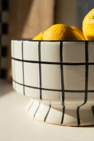 Close-up image of the Monochrome Checkered Bowl On Stand