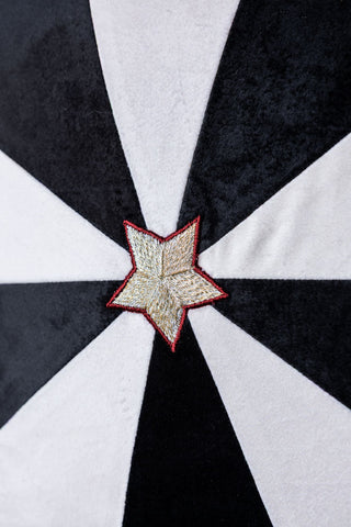 Close-up image of the Monochrome Embroidered Star Cushion