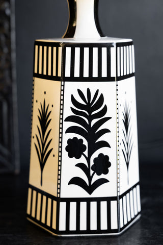 Detail of the ceramic base of the Monochrome Folklore Floral Table Lamp.