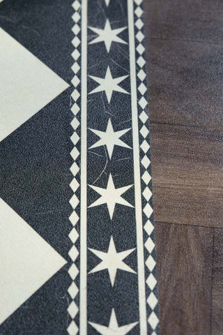 The star border of the Monochrome Marble Tile Effect Durable Runner. 
