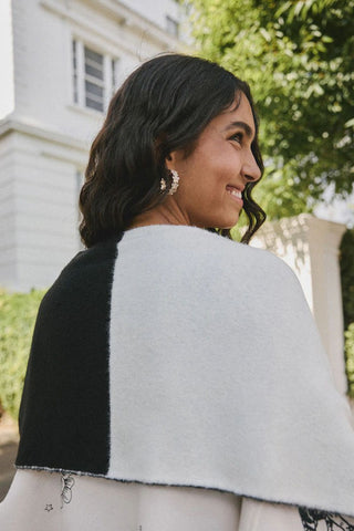 Image of the back of the Monochrome Printed Hands Scarf