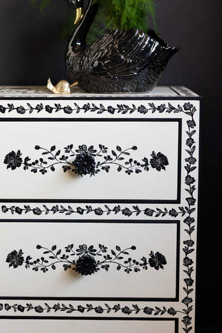 Close-up of the front of the Monochrome Rose Noir Chest Of Drawers.