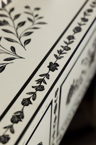 Close-up of the top of the Monochrome Rose Noir Console Table.