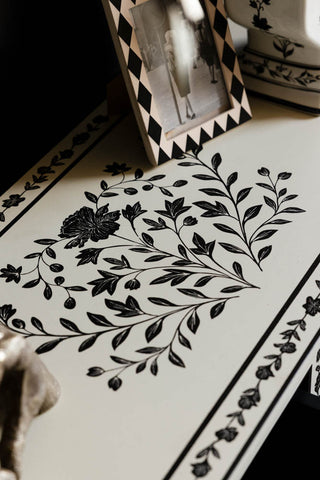 Close-up of the design on top of the Monochrome Rose Noir Console Table.