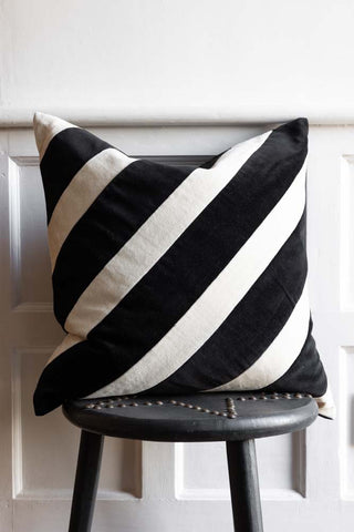Lifestyle image of the Monochrome Stripe Velvet Cushion