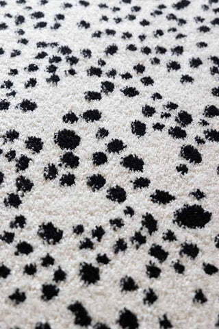 Close-up image of the Muse Monochrome Dalmatian Spot Rug  - 2 Sizes Available