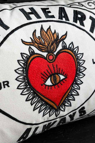 Close up image showing the embroidery detailing on the My Heart Monochrome Embroidered Cushion. 