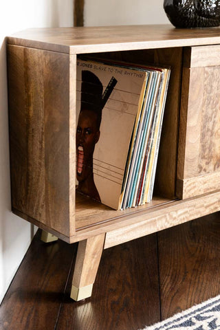 The side shelf of the Natural Leopard Print Corner TV Unit, behind the sliding leopard door. 