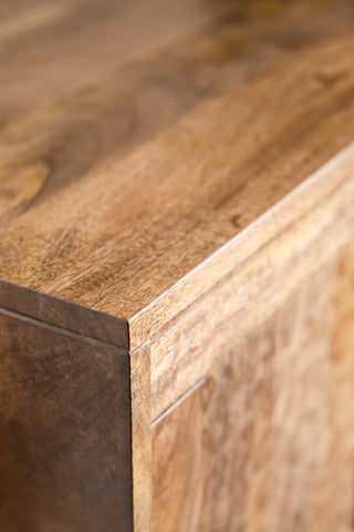 The corner detailing of the Natural Leopard Print Corner TV Unit.