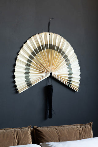 Lifestyle image of the Natural & Black Fan Wall Decoration