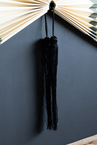 Close-up image of the Natural & Black Fan Wall Decoration