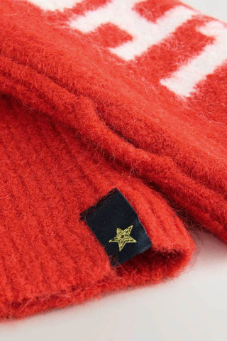 Close-up of the star design on the Naughty or Nice Handwarmers, displayed on a white background.